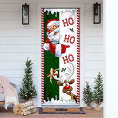 a christmas door cover with santa clause and reindeers