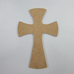 a wooden cross on a white background