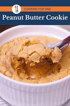 peanut butter cookie in a white bowl with a spoon