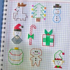 an open notebook with christmas themed drawings on the page and colored pencils in it