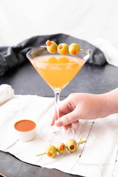 A truly hot and dirty martini! A spicy martini dirtied up with salty olive juice—the salty & spicy kick you've been looking for!  | Recipe at BeamingBaker.com Pickle Martini Recipe, Gf Food, Spicy Cocktail, Olive Recipes, Vodka Martini