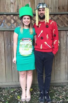 a man and woman dressed up in costumes