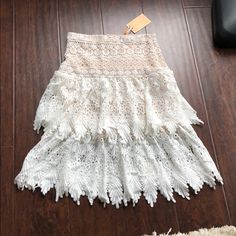 Nwt! Champagne And Strawberry Skirt Size Small. Beautiful Crochet Lace Detail All Around This Tier Skirt. White With A Mini Nude Underlining Skirt. Hidden Side Zipper. 100% Polyester. Front Length 25” Waist 14”. Any Questions Please Ask. ***If This Item Meets Your Expectations Please Rate Me Thanks *** Strawberry Skirt, Rate Me, Strawberry Champagne, Lace Midi Skirt, Strawberry Cream, Skirt White, Lace Midi, Strawberries And Cream, Tier Skirt