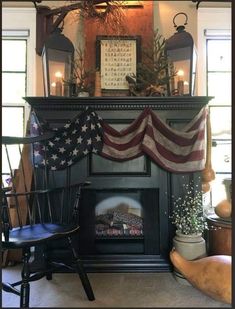 an american flag draped over a fireplace in a living room