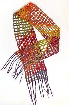 an orange and green scarf on a white background