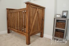 a wooden crib sitting in the corner of a room