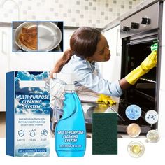 a woman cleaning an oven with yellow gloves