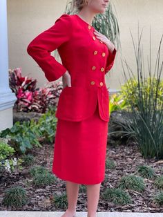 Red linen vtg YSL skirt suit size 40 (US M or 10) made in France is in excellent vintage condition, only flaws are bleached lining in underarm area and a lining repair in the area, no staining visible on linen exterior. All original buttons in excellent condition, linen fabric in excellent condition. Front patch pockets on blazer, slash pockets on skirt. Lovely power suit for your office work wardrobe! Jacket bust measures 19” across when buttoned, waist 34”, shoulder 15”, length 27”, sleeve 22”. Skirt waist 29”, hip 38”, length 25”. Fully lined. 100% linen flax. Please feel free to contact me with any questions about this red vintage power suit by designer Yves Saint Laurent size 40 10 Ysl Skirt, Blazer Gold Buttons, Vintage Yves Saint Laurent, Power Suit, Red Vintage, Suit Separates, Breasted Blazer, Double Breasted Blazer, Work Wardrobe