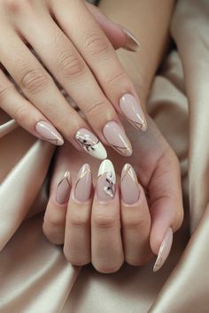 Elevate your nail game with these classy almond nails, perfect for any season. This chic design features a delicate blend of natural and nude tones, enhanced by subtle rhinestones that catch the light beautifully. Ideal for those who appreciate pretty, understated elegance, these nails are a versatile choice for both everyday wear and special occasions. Discover more adorable inspo for your next salon visit! #AlmondNails #NailArt #TrendyNails #ElegantNails Classy Almond Nails, Understated Elegance, Chic Design, Design Features