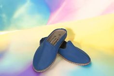 Flat 100% handcrafted stylish house shoes. These flat genuine leather blue half slippers will be a great authentic gift for your family, friends and of course for yourself. Our traditional  shoes are suitable for wearing inside or / and outside.  100% Handcrafted and made by genuine leather. Optionally, 2 mm rubber outsole can be attached which is useful for slippery surfaces. Moreover, having heel on this slippers is possible (0.6 cm). Kindly check the drop-box menu. Kindly, message us if you w Traditional Shoes, Color House, Half Slippers, Half Shoes, Shoes Stand, Drop Box, House Shoes, Stitching Leather, Handcrafted Leather