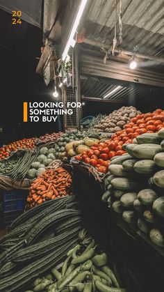 there are many different types of vegetables in this market stall with the words looking for something to eat