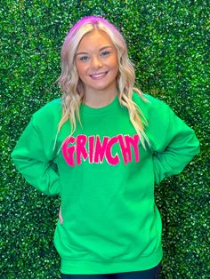 Add a dash of Christmas cheer to your wardrobe with this Hot Pink GRINCHY Chenille Sweatshirt! Featuring an Irish green sweatshirt with a hot pink GRINCHY chenille, it's the perfect accessory for your favorite movie, Christmas morning, party, or pajama outfit. Comfy and fun, everybody needs one of these for some holiday cheer! Unisex sizing and fit Available in Adult Sizes SPECIAL CARE - WASHING INSTRUCTIONS: Hand washing and air drying are always best for these items. Wash on delicate, cold, an Green Casual Holiday Sweater, Casual Green Holiday Sweatshirt, Casual Green Sweatshirt For Holidays, Casual Green Holiday Sweater, Green Holiday Sweatshirt For Fall, Green Fall Holiday Sweatshirt, Holiday Green Cotton Sweatshirt, Green Cotton Holiday Sweatshirt, Grinch Outfit Women