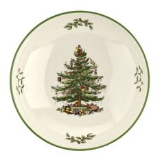 a christmas tree on a white plate with green trim