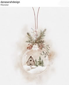 a christmas ornament with a house in the snow and evergreens on it