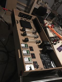 an assortment of electronic equipment sitting on top of a table