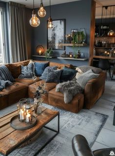 a living room filled with lots of furniture next to a large glass window and a wooden coffee table