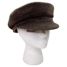 Command your wardrobe with this Hermes Wool Fisherman hat. This wool silk blend hat is perfect for winter and fall festivities. It will offer you the warmth and comfort you need for the winter months without sacrificing you any style points. Pair with your favorite Chanel tweed or Ysl trench coat Made in France size 57 British Hats Women, French Hats, Le Kilt, Historical Hats, Fall Festivities, Chanel Tweed, Fisherman Hat, Fall Festival, Winter Months