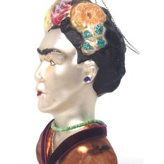 a woman's head is adorned with colorful beads