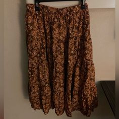 J Crew Women’s Brown Floral Skirt Size Large With Pockets Brown Ruffled Skirt Bottoms, Brown Skirted Bottoms With Ruffled Skirt, Brown Skirted Bottoms With Ruffled Detail, Brown Ruffled Skirted Bottoms, Casual Brown Maxi Skirt For Vacation, Casual Brown Ruffled Skirt, Brown Relaxed Fit Skirt For Day Out, Brown Tiered Skirt With Lining, Casual Brown Skirt For Vacation