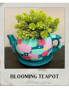 a potted plant sitting on top of a teapot with the words blooming teapot above it