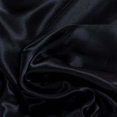 the black fabric is very soft and shiny