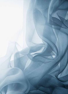 an abstract photo of blue and white fabric