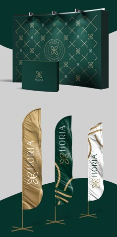 an assortment of banners and flags with gold foil on them, all in different colors