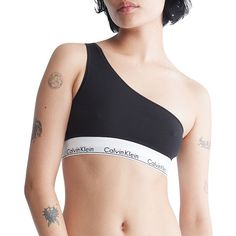 A Calvin Klein icon. This modern cotton bralette is the definition of effortless. Made with super soft and supple cotton stretch blended with modal, this women's Calvin Klein One-Shoulder bralette is designed for all day comfort. A Calvin Klein icon. This modern cotton bralette is the definition of effortless. Made with super soft and supple cotton stretch blended with modal, this women's Calvin Klein One-Shoulder bralette is designed for all day comfort.Click on this INTIMATES & SLEEPWEAR Guide Modern Fitted Calvin Klein Top, Calvin Klein Seamless Sports Bra With Medium Support, Calvin Klein Stretch Seamless Sports Bra, Calvin Klein Sporty Medium Support Sports Bra, Calvin Klein Medium Support Seamless Sports Bra, Calvin Klein Seamless Spring Bra, Unlined Bra Calvin Klein, Calvin Klein Bra Black, Calvin Klein Sports Bra