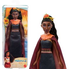 the doll is wearing a black dress with orange accents