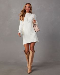 We love the cozy western vibes of the Wendy Fringe Trim Mini Sweater Dress. Appropriate for fall outings and beyond with bold, fringe trim along the bust area and cable knitting throughout. This mini-length dress has long sleeves and looks amazing with tall western boots. Fitted High neckline Fringe trim Non-stretch knit fabrication 100% Acrylic White Sweater Dress With Boots, Shower Dress For Bride, Tall Western Boots, Fall Outings, Tall Western Boot, White Sweater Dress, High Boots Outfit, Western Vibes, Bridal Shower Outfit