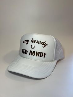 Our Say Howdy Stay Rowdy trucker hat is perfect for this summer. You can dress it up or down and it will elevate your outfit! *THINGS TO NOTE* + Our trucker hats are made from 100% polyester with an adjustable mesh backing, making the hats both breathable and easy to find your perfect fit. + Orders only include trucker hat + One size fits most! + Message us for custom requests! White Outdoor Hats With Letter Print, White Outdoor Hat With Letter Print, White Letter Print Hat For Outdoor, Trendy White Snapback Hat For Outdoor, Trendy White Trucker Hat With Short Brim, Trendy Adjustable White Trucker Hat, Trendy White Trucker Hat For Outdoor, Trendy White Adjustable Trucker Hat, White Adjustable Trendy Trucker Hat