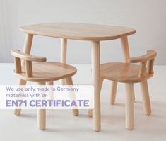 two wooden chairs and a table with the words we use only made in germany materials with an en1 certificate