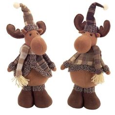 two stuffed animals dressed in plaid outfits and hats, one is wearing a hat and the other has a scarf