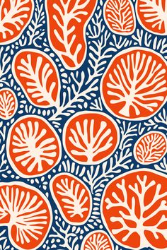 an orange and blue pattern with white leaves on the bottom, in shades of red