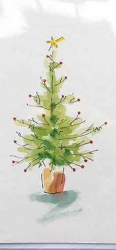 a watercolor painting of a small christmas tree