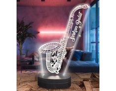 a light up musical instrument with the words thank you for making music on it's side