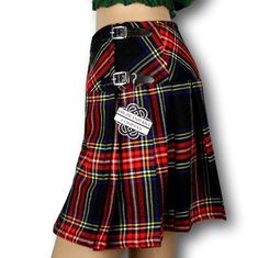 The women's tartan billie skirt is a stylish and versatile garment that combines classic Scottish heritage with contemporary fashion. Made from high-quality tartan fabric, the billie skirt showcases a beautiful array of colors and patterns, reflecting the rich tradition of Scottish plaids. The skirt features a flattering A-line silhouette that flares out from the waist, creating a feminine and elegant look. It typically falls just above or below the knee, offering a modest yet fashionable length Fitted Plaid Pleated Mini Skirt, Fitted Pleated Plaid Mini Skirt, Fitted Plaid Mini Skirt, Scottish Style Plaid Lined Skirt, Fall Scottish Pleated Skirt, Scottish Style Fitted Pleated Skirt For Fall, Fitted Pleated Plaid Bottoms, Fitted Pleated Plaid Skirt, Scottish Plaid Skirt For Fall