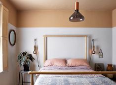 an image of a bed with pink sheets and pillows in the room that is featured on instagram