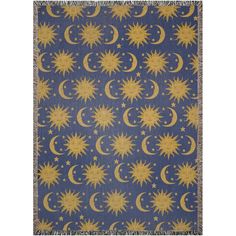 a blue rug with yellow stars and crescents on it