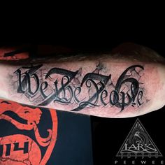 a man's arm with the words we are dead on it and an image of a