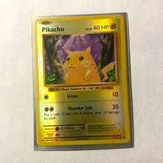 a pokemon trading card with pikachu on it