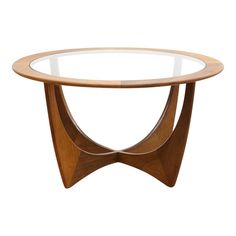 an oval glass table with wooden legs and a wood base, on a white background