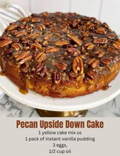 a pecan upside down cake on a white plate