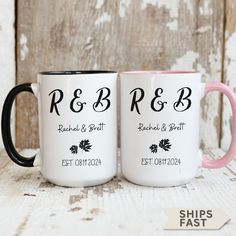 two coffee mugs with the names r & b and rgbb on them