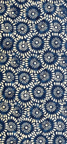 a blue and white flower print fabric