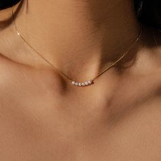 Dive into the timeless elegance of Ecksand's Renewal Collection, where the splendour of the sea is gracefully handcrafted into attainable luxury. Carrying a profound connection to nature, the pearls of this Freshwater Pearl Necklace nestle within handcrafted settings of 100% recycled gold, curated for their lustrous charm. Freshwater pearls: Each 3-3.5 mm approx. Chain length: 16 / 18 in. Chain width: 1 mm approx. Chain type: Diamond-cut trace chain Closure: Lobster clasp Minimal Pearl Necklace, Minimal Jewellery, Types Of Diamonds, Freshwater Pearl Necklace, Minimal Jewelry, Grad Gifts, Necklace Charm, Pearl Set, Freshwater Pearl Necklaces