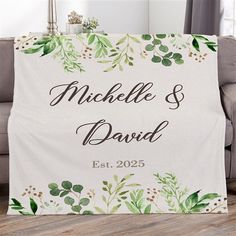 a personalized blanket with greenery on it