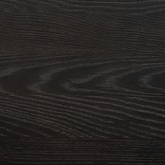 the wood grain is black and brown in color