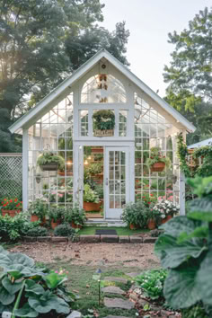 30 Greenhouse Designs to Add Charm to Your Backyard Functional Garden Design, Cottage Style Greenhouse, Country Cottage Outdoor Space, Flower Garden Greenhouse, Pretty Garden Sheds, How To Build A Greenhouse Out Of Windows, English Cottage Greenhouse, Tiny House Greenhouse