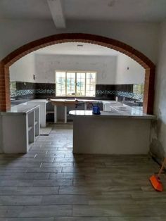 the kitchen is being remodeled and ready to be used as a dining room or office